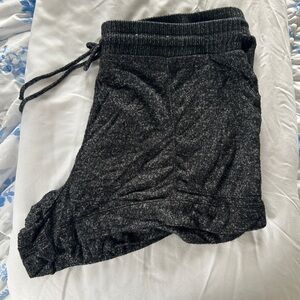 Stars above black pajama shorts